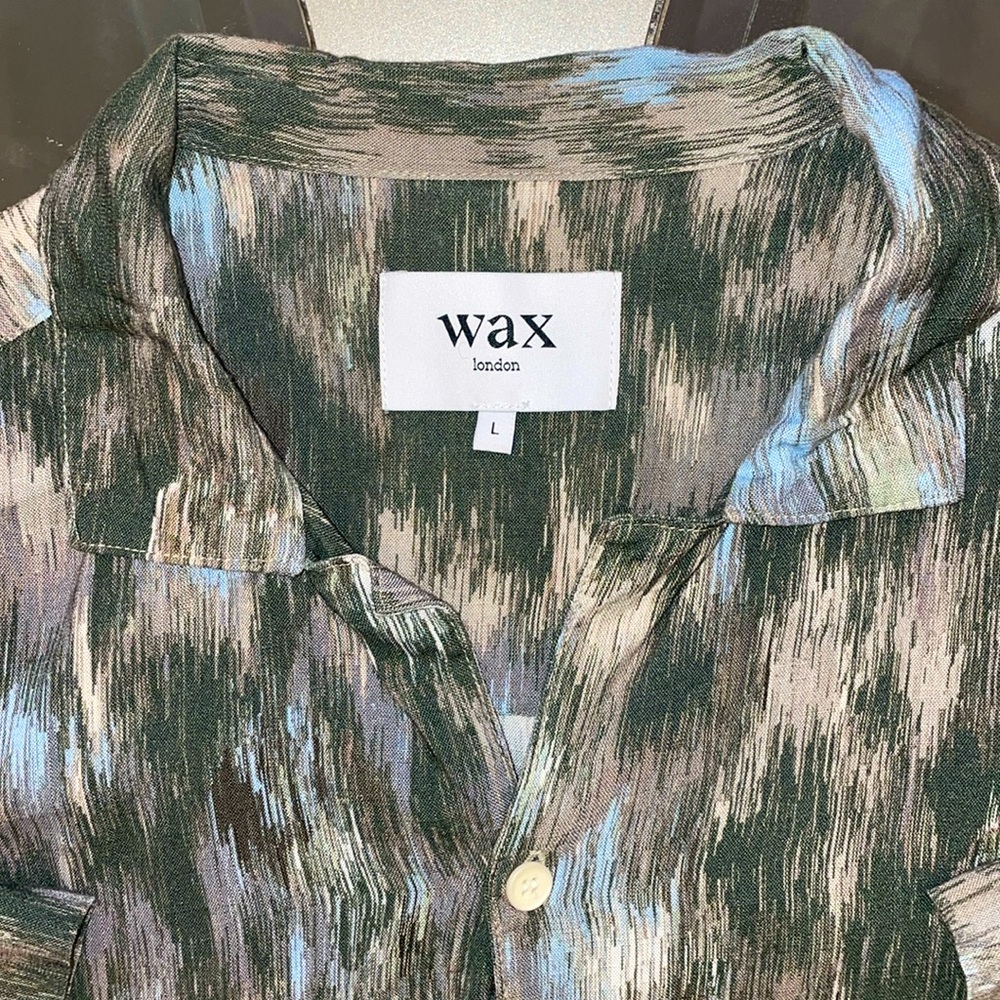 Wax short sleeved button up shirt.